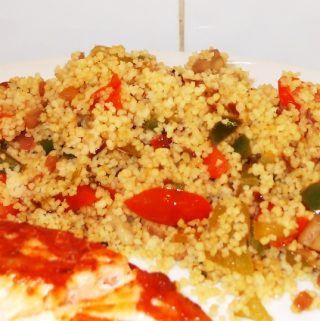Speedy Mediterranean Vegetable Couscous - a delicious side dish served here with pan fried salmon.
