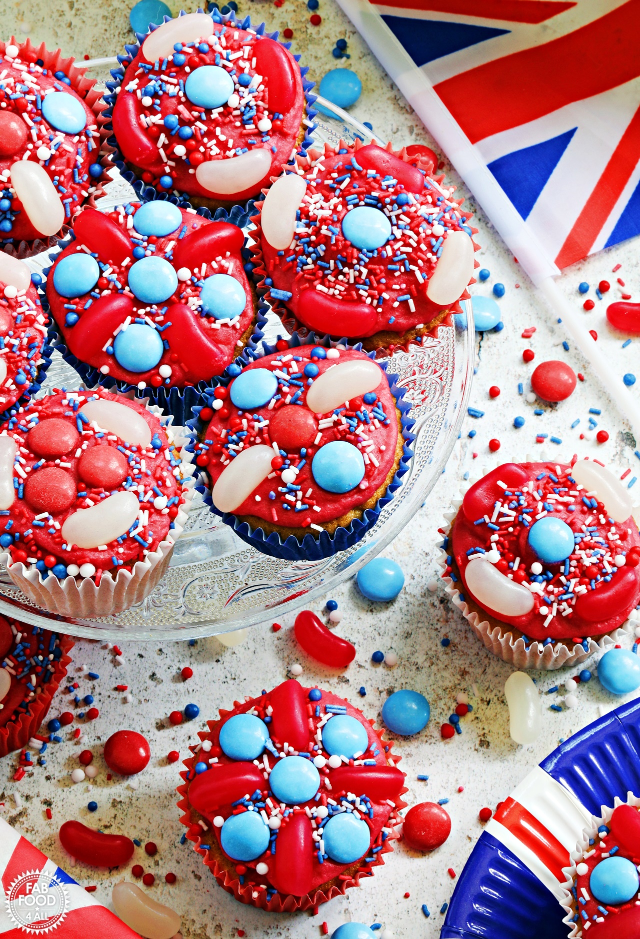 Jubilee Cupcakes on a cake stand with Union Jack flag and plate.