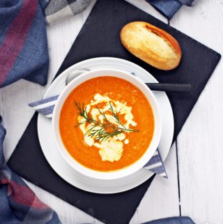 Tomato, Carrot and Dill Soup - creamy, garlicky & delicious! This soup was a best seller when I worked in catering and a personal favourite! #tomato #carrot #dill #soup #souprecipes #tomatorecipes #carrotrecipes #vegetarianrecipes #vegetarian #vegetablesouprecipes #vegetablesoup