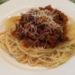 Simply Delicious Spaghetti Bolognese on a plate.