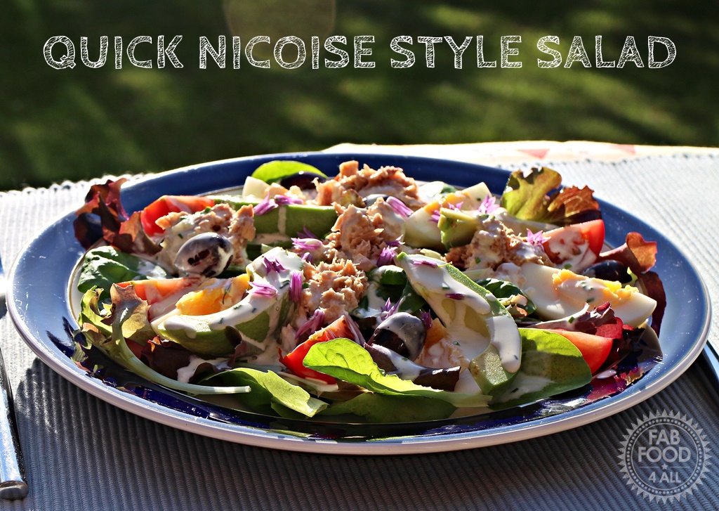 Quick Nicoise Style Salad on a plate in garden.