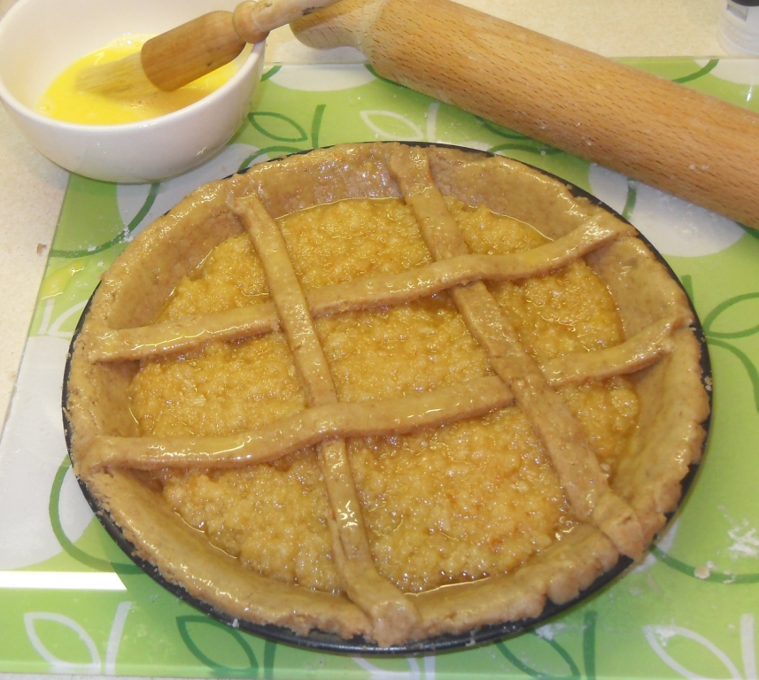Treacle Tart finished off with pastry lattice and egg wash.
