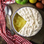 Apple Meringue in a dish with portion removed.