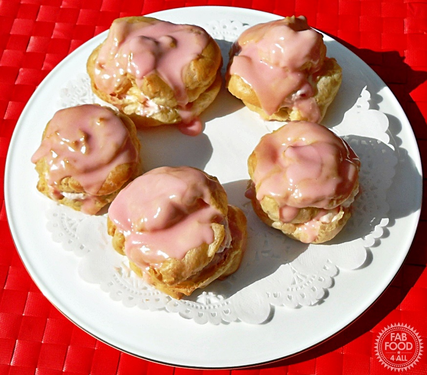 Strawberry Choux Buns on a plate aerial shot