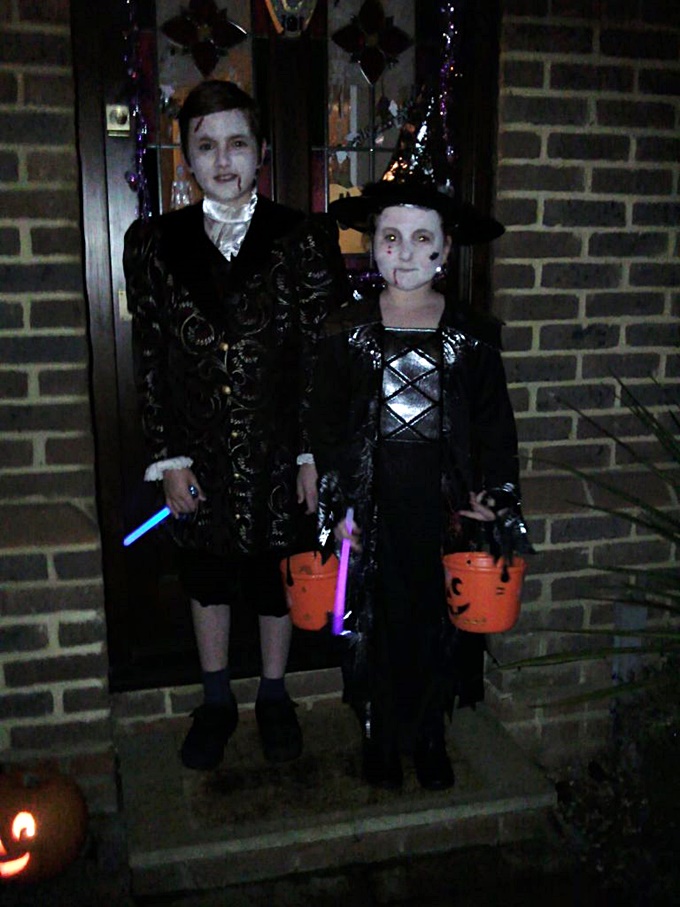 Kids in Halloween costume.