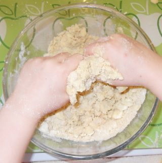 Hallon Cookie dough being mixed by hand.