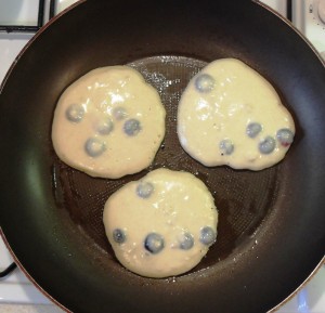 Blueberry & Banana Pancakes in a frying pan