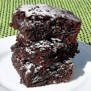 3 Specunana Brownies stacked on a plate.