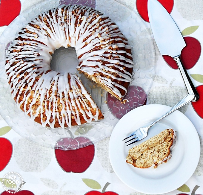 Spelt Danish Apple Ring overhead view with slice on a plate.