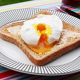 Perfect poached egg on toast.