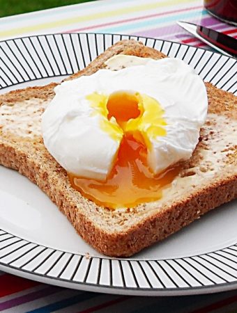 Perfect poached egg on toast.