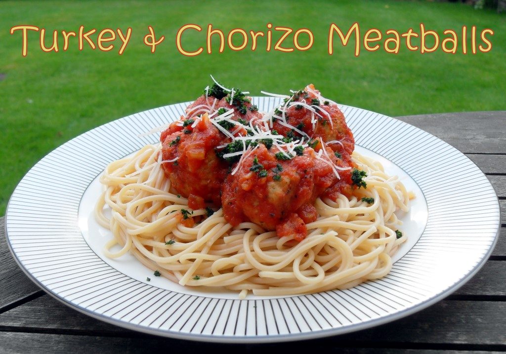 Turkey & Chorizo Meatballs in tomato sauce on a bed of spaghetti.