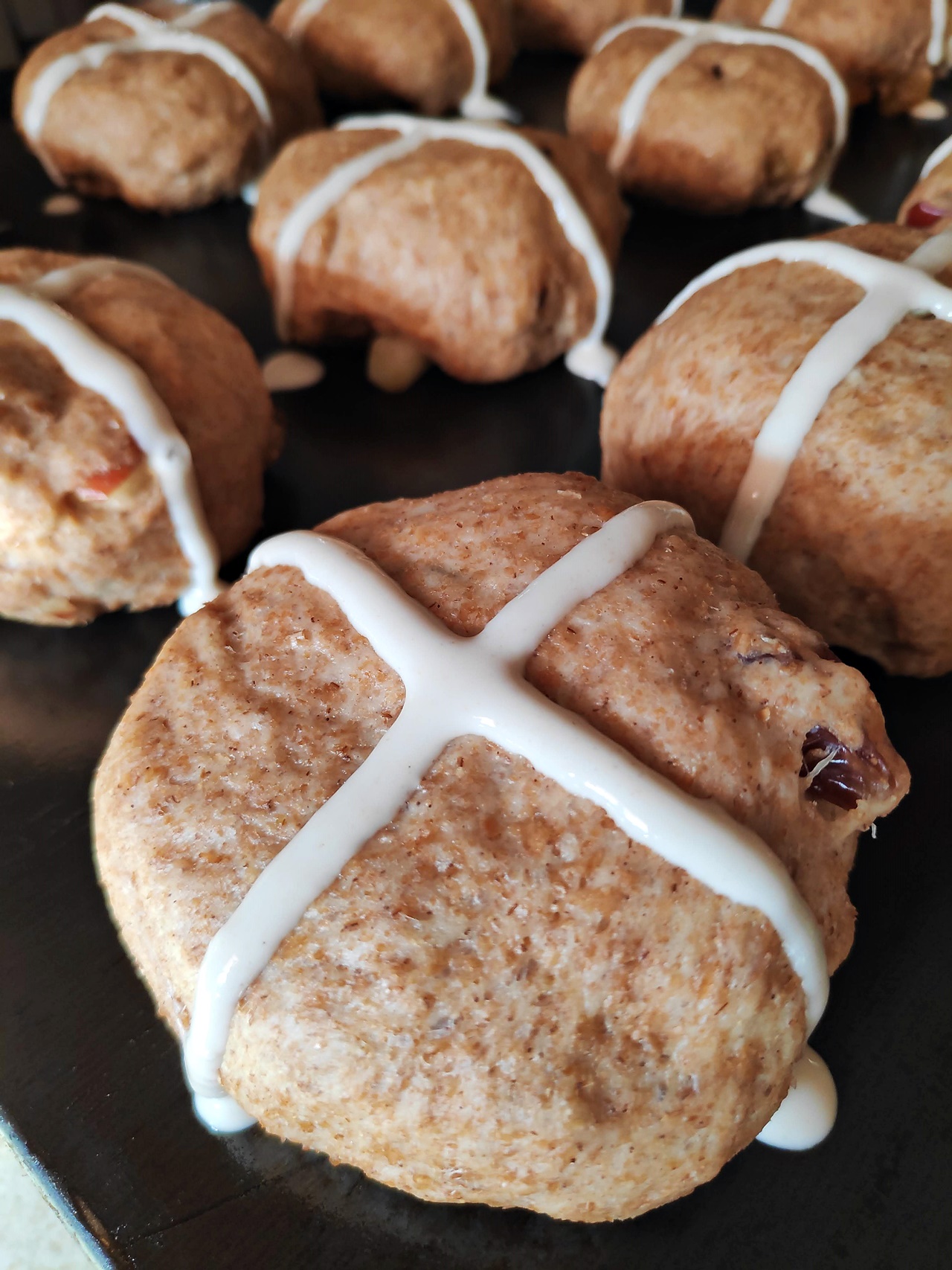 Wholemeal Apple Hot Cross Buns with flour & water crosses before baking.