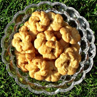Danish Vanilla Wreaths (Vanille Kranse) in a glass bowl. Aerial view.