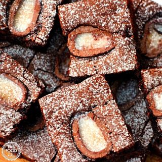Close up of Creme Egg Chocolate Brownies stacked on top of each other - aerial view.