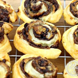 Leftover Pastry Banana Nutella Pinwheels on a wire rack.