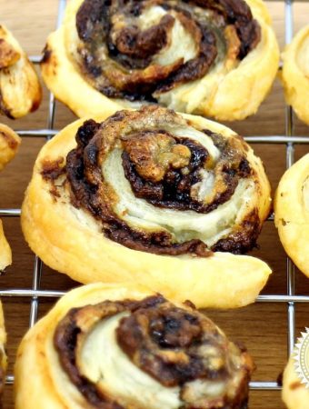 Leftover Pastry Banana Nutella Pinwheels on a wire rack.