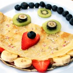 Monster Panccakes -with kiwi, blueberry, strawberry & banana faces.