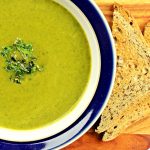 Kale Soup in a bowl with toast.