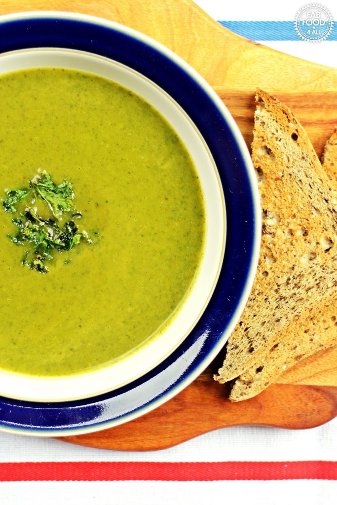 Butternut Squash & Kale Soup in a bowl with toast.
