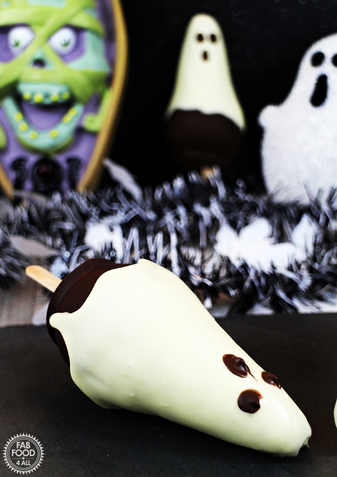 Chocolate Pear Ghosts with spooky backdrop.