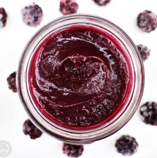Easy Blackberry Curd overhead shot with blackberries surrounding jar.