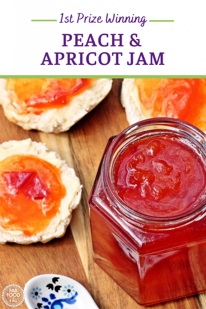 Close up of Jar of Peach & Apricot Jam with a spoon and scones on a wooden board. Pinterest image..