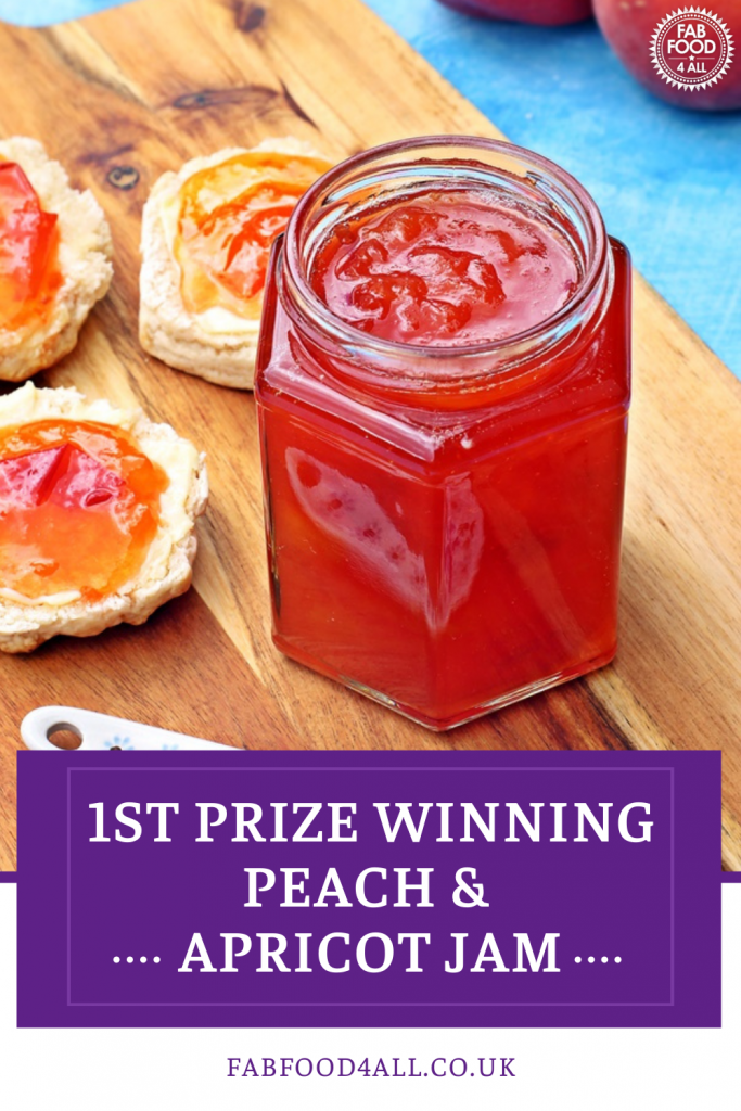 Jar of Peach & Apricot Jam with a spoon and scones on a wooden board Pinterest image.