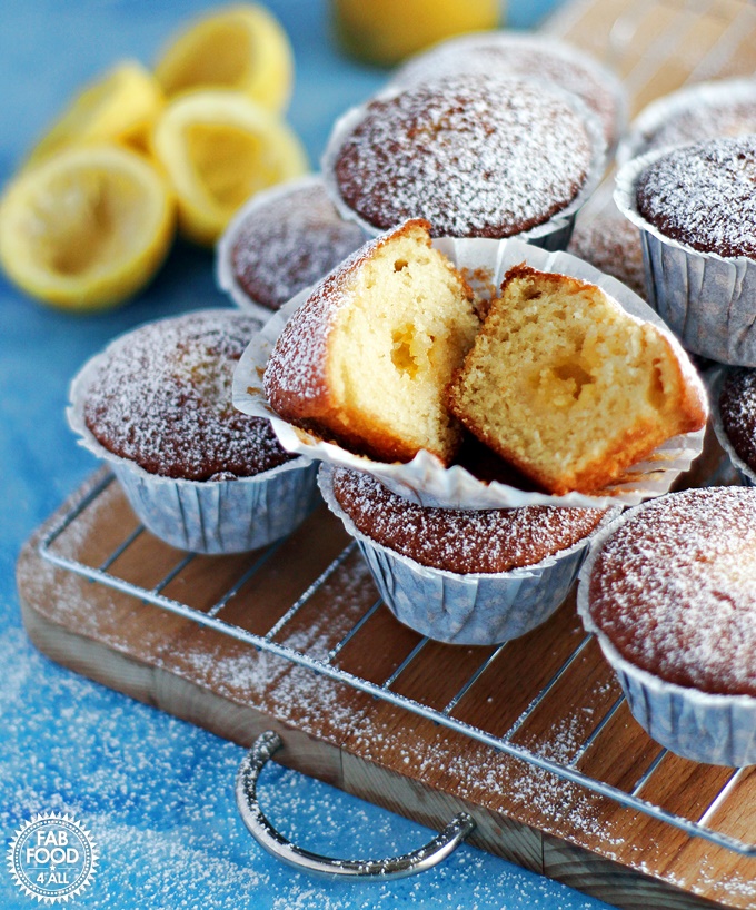 Easy Lemon Curd Muffins on a wire rack and wooden board