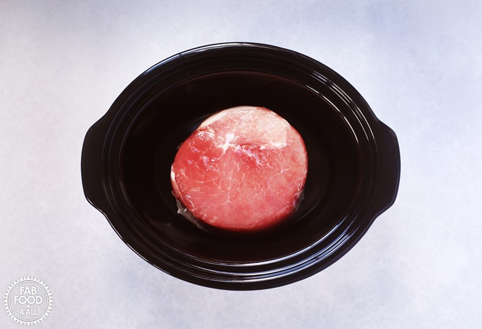 Raw gammon in a slow cooker (Crockpot).