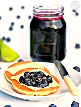 Blueberry & Lime Jam with a plate of scotch pancakes.