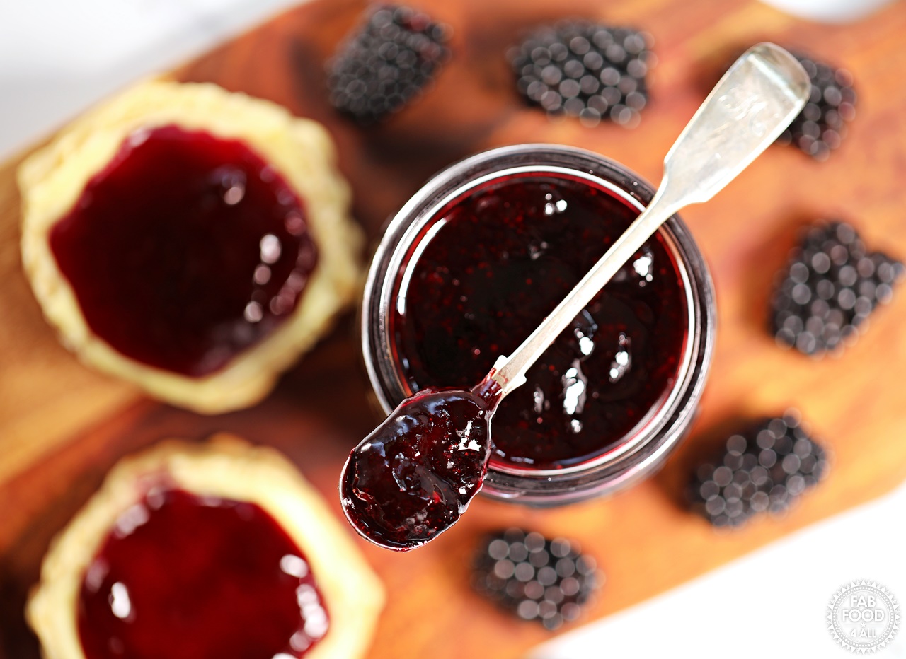 Easy Seedless Blackberry Jam with scone., aerial view.
