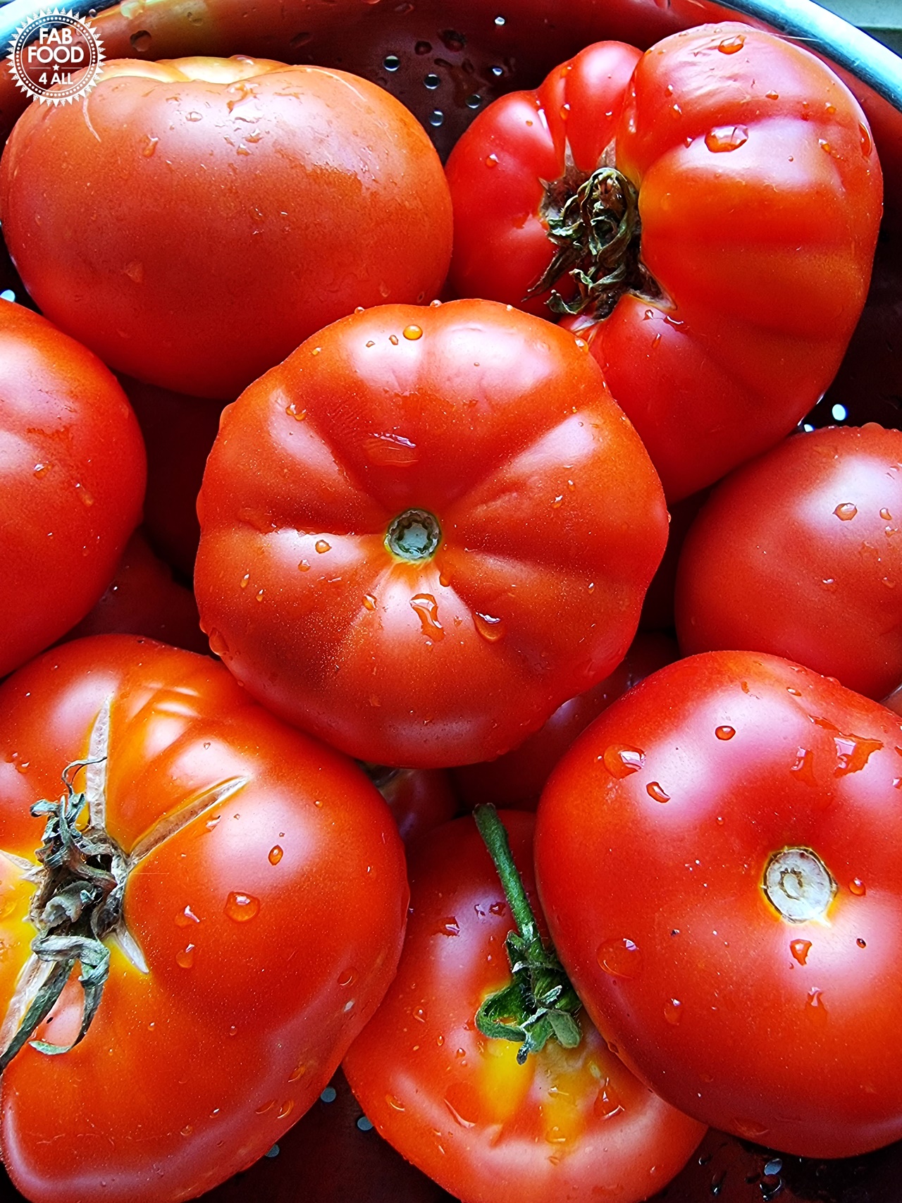 Marmande tomatoes in a colander.