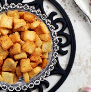 Garlic Croutons in a glass bowl.