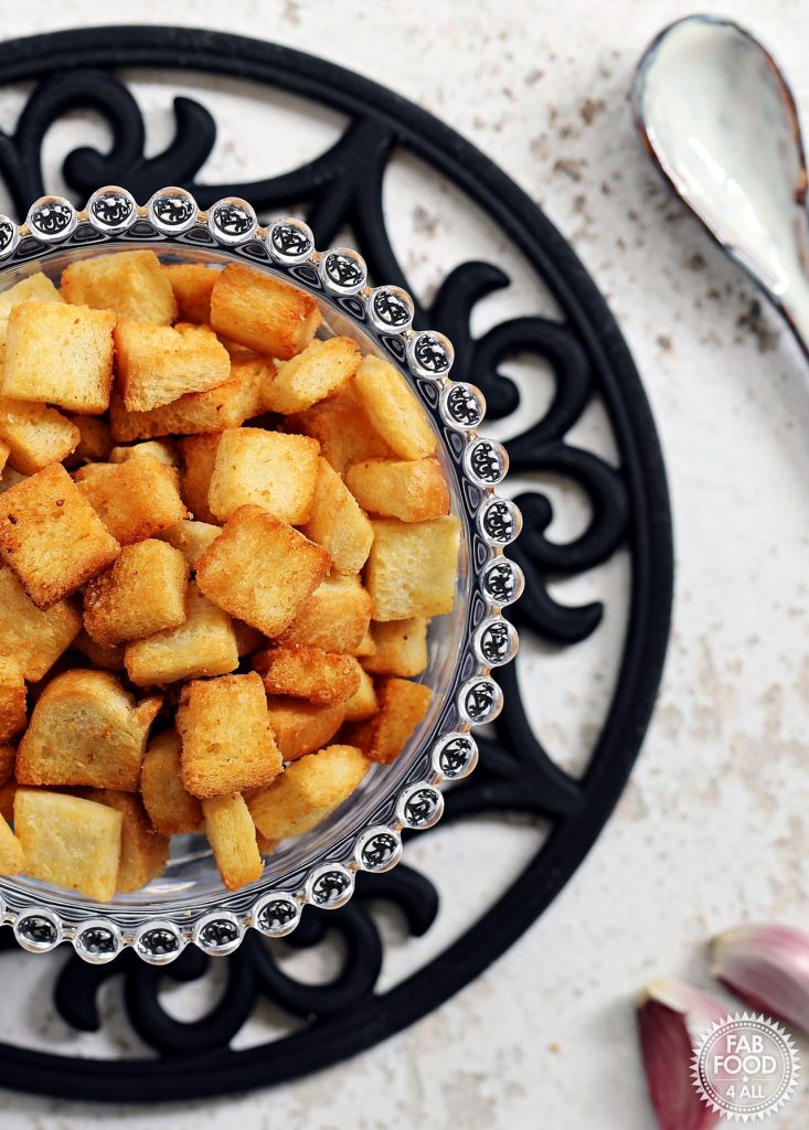 Garlic Croutons in a glass bowl.