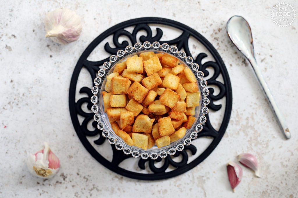 Easy Garlic Croutons in a glass bowl.