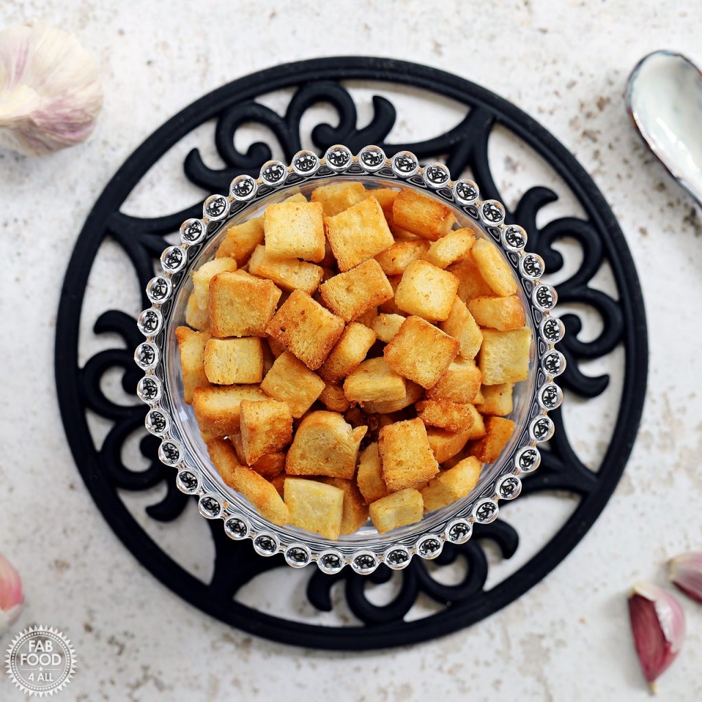 Easy Garlic Croutons in a glass bowl.