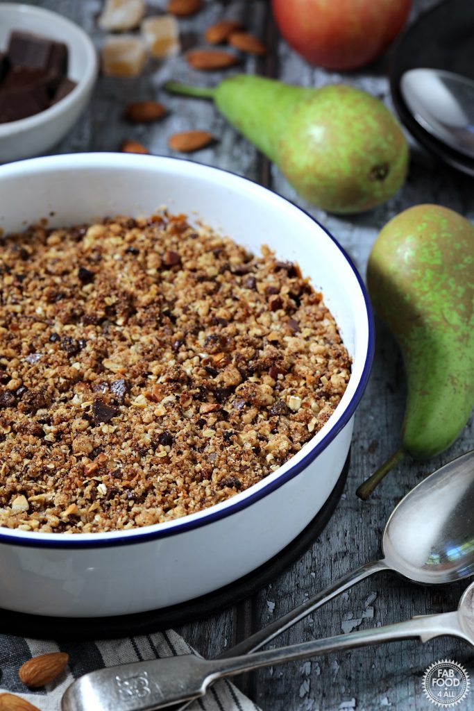 Pear, Chocolate & Ginger Crumble in enamel serving dish.