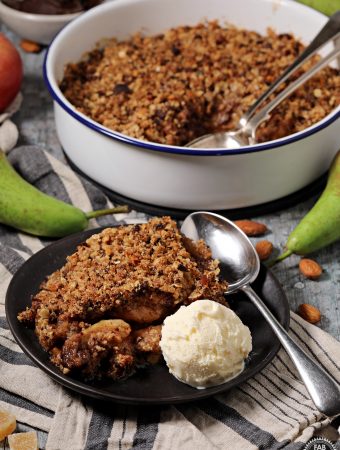 Pear, Chocolate & Ginger Crumble served with ice cream.