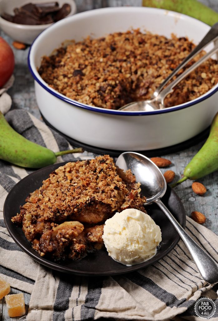 Pear, Chocolate & Ginger Crumble served with ice cream.