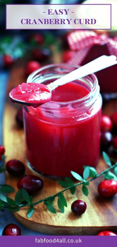 Easy Cranberry Curd Pinterest image showing jar with spoonful of curd resting on top.