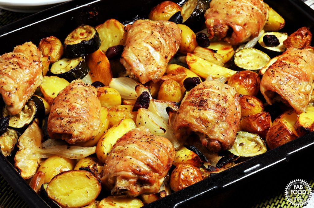 Easy Greek Chicken & Potatoes in roasting tray.
