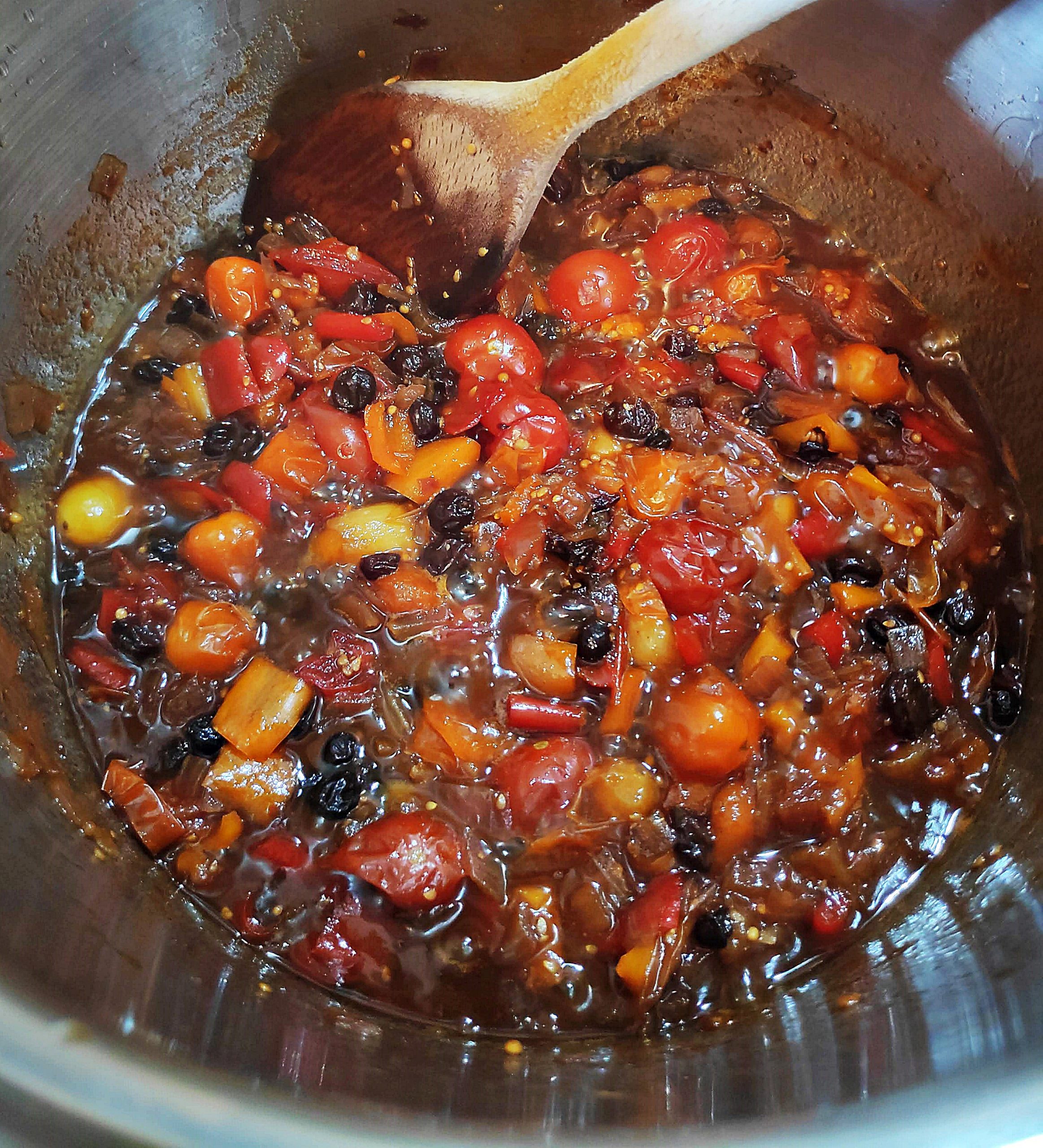 Pan of Spicy Baby Tomato & Sweet Pepper Chutney with added cherry tomatoes.