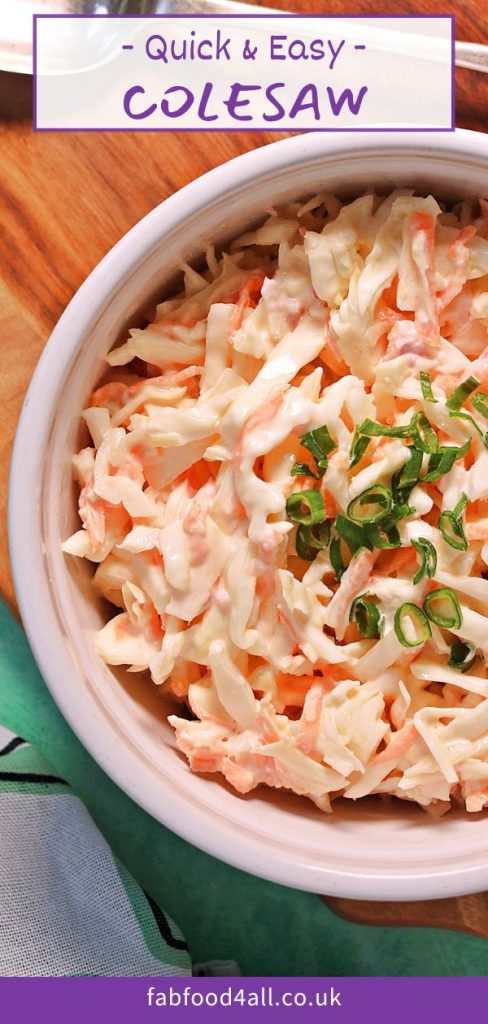 Coleslaw Pinterest Image - bowl of quick & easy coleslaw on a board with serving spoon.