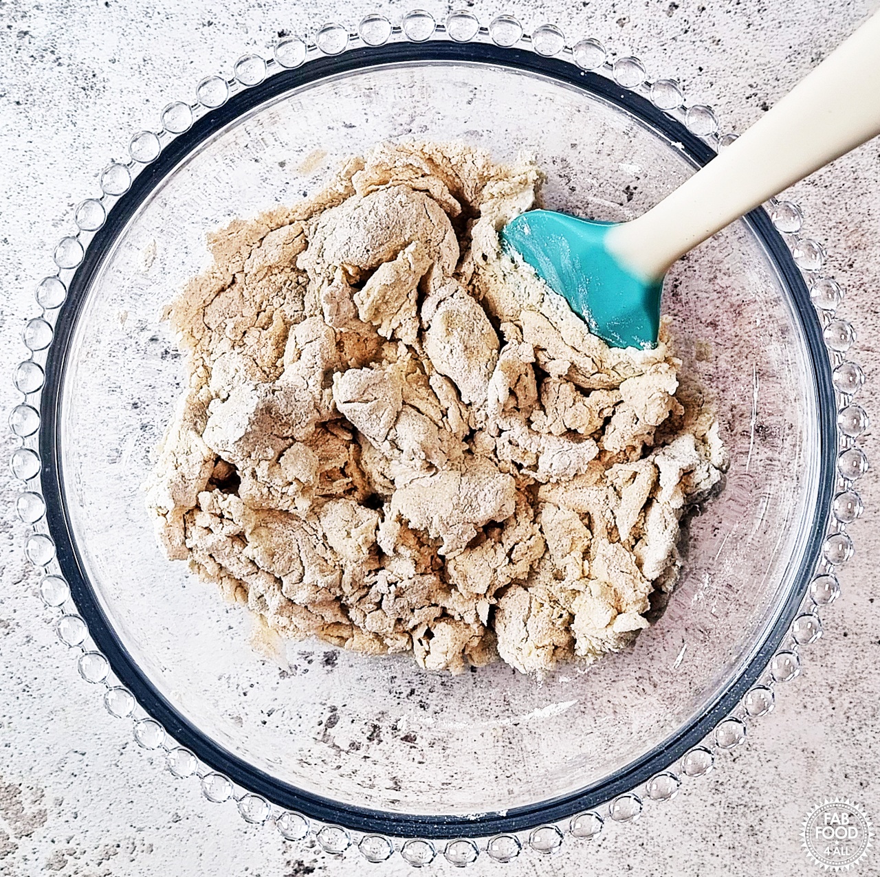 Greek yogurt, spelt flour, baking powder and salt mixed to a shaggy dough with a rubber spatula.