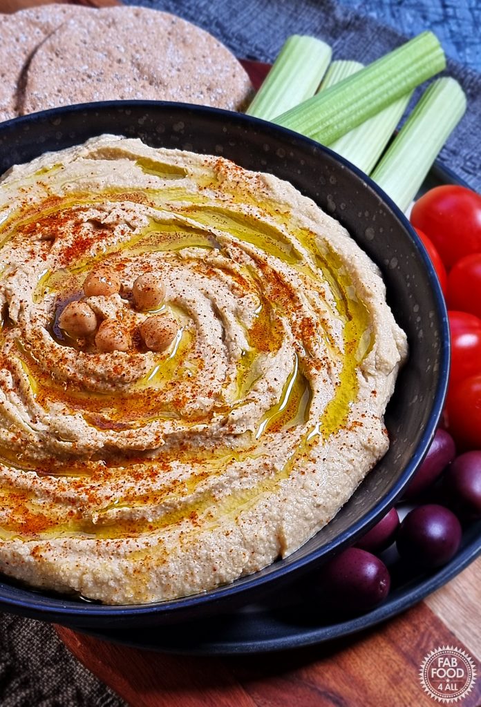 Quick Homemade Hummus with crudités and crackers.