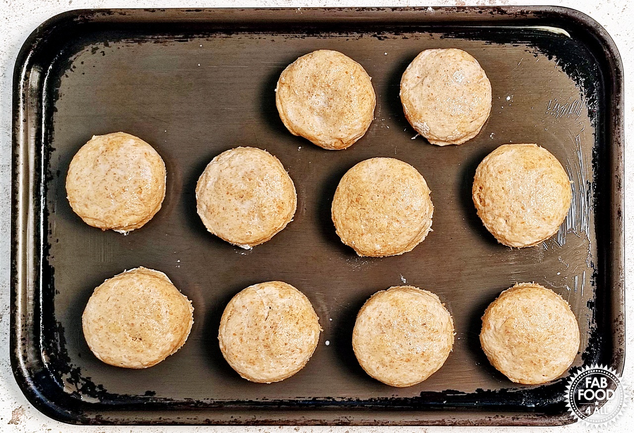 Cut out spelt scone dough shapes on a lightly greased baking tray.